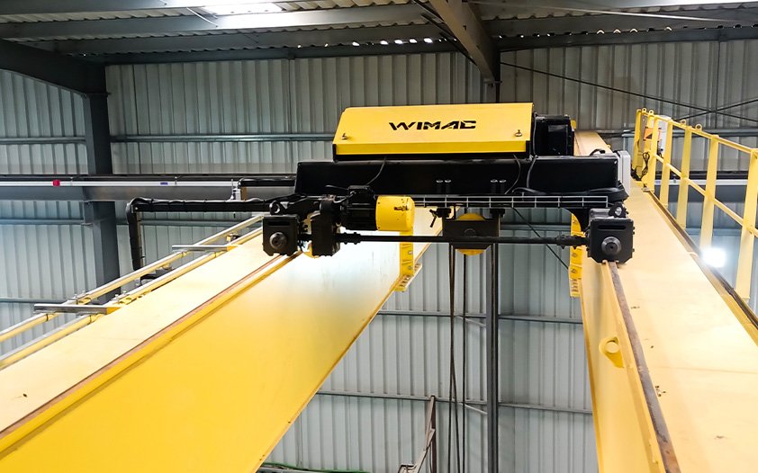 Wimac double girder overhead crane installed in industrial production facility &mdash; high-capacity continuous-duty bridge crane up to 320 t