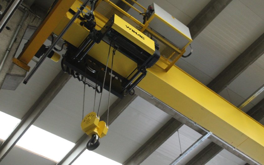 Single girder overhead crane end carriage with forged steel wheels and VFD long-travel drive for runway-rail operation