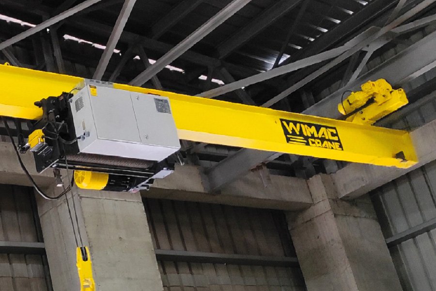 Underslung overhead crane trolley and hoist for low-headroom buildings