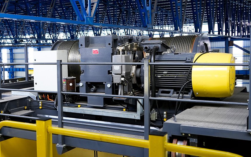 Wimac process crane installed in steel mill production facility — FEM M7/M8 duty class for high-cycle industrial lifting