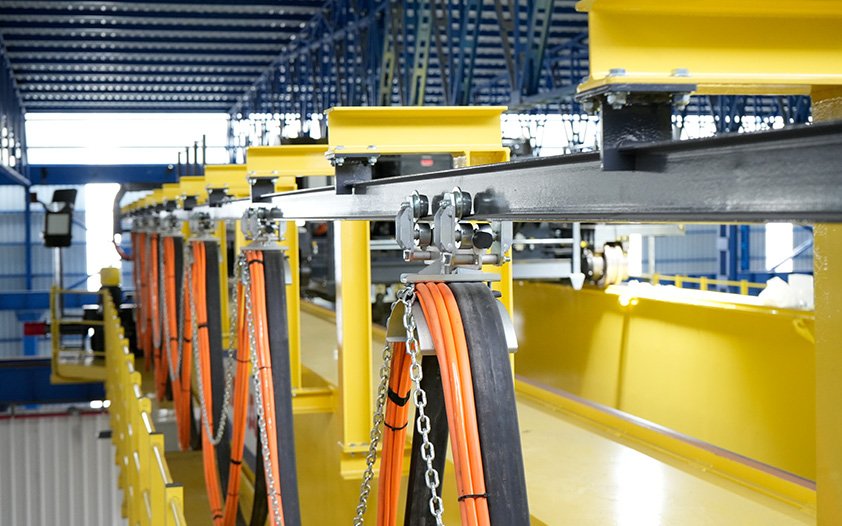 Process crane wire rope hoist and trolley system designed for 24/7 high-cycle service in heavy industry